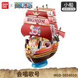 Figurine bateau One Piece Big Mom avec détails colorés et voiles rouges, idéale pour les collectionneurs