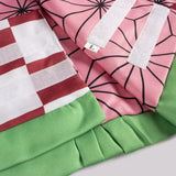 Détails du costume Nezuko Kamado avec motifs floraux roses et finitions vertes