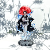 Figurine Demon Slayer 16 cm avec un personnage en tenue sombre et un fond de lune rouge