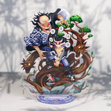 Figurine Demon Slayer 16 cm représentant un combat intense entre deux personnages emblématiques dans un décor dynamique