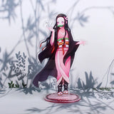 Figurine Demon Slayer 16 cm représentant un personnage féminin avec un kimono coloré et un masque