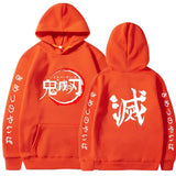 Sweat à capuche Demon Slayer en orange avec motifs japonais et logo de la série sur la poitrine