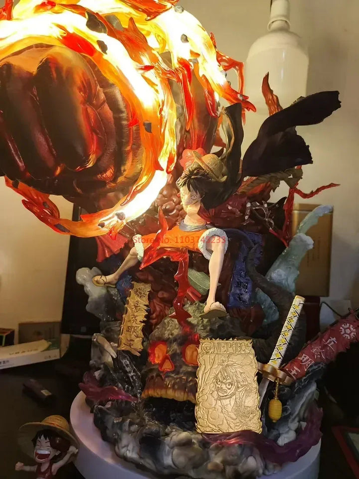 Figurine Luffy Red Rock avec effets lumineux et détails sculptés pour les fans de One Piece