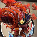 Figurine Luffy Red Rock avec des détails vibrants et des couleurs éclatantes dans une pose dynamique
