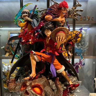 Figurine Luffy One Piece en pose dynamique avec des personnages emblématiques de l'univers One Piece
