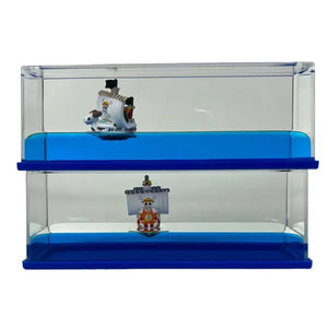 Réplique en bouteille One Piece avec deux navires en miniature dans un décor aquatique
