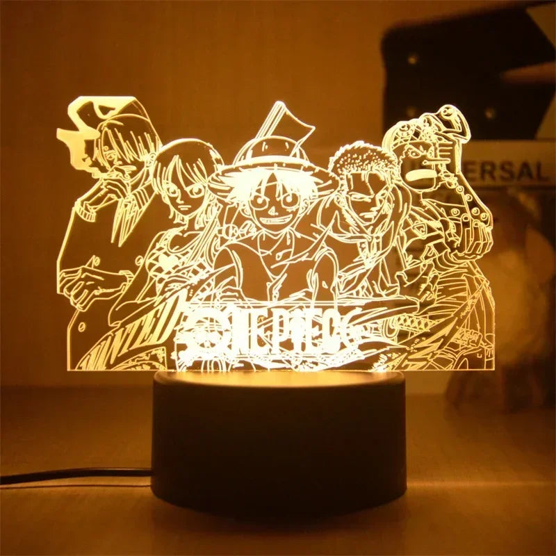 Veilleuse 3D One Piece avec personnages de l'anime éclairant la pièce dans une ambiance chaleureuse